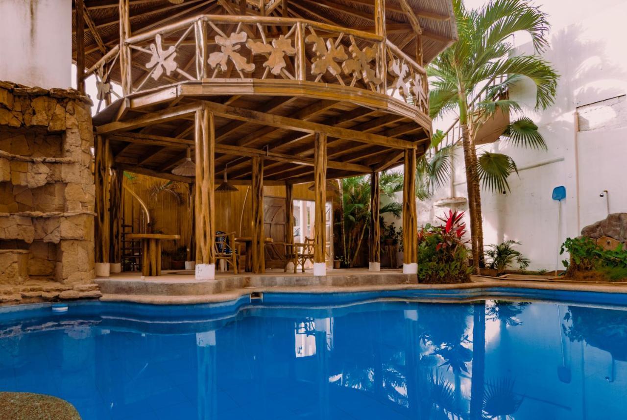 Hostal Poseidon Puerto Cayo Exterior photo